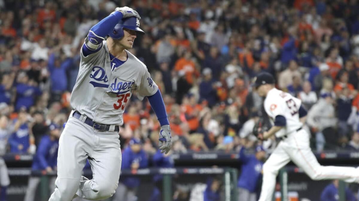 Cody Bellinger reacts after hitting an RBI double to break a 1-1 tie.