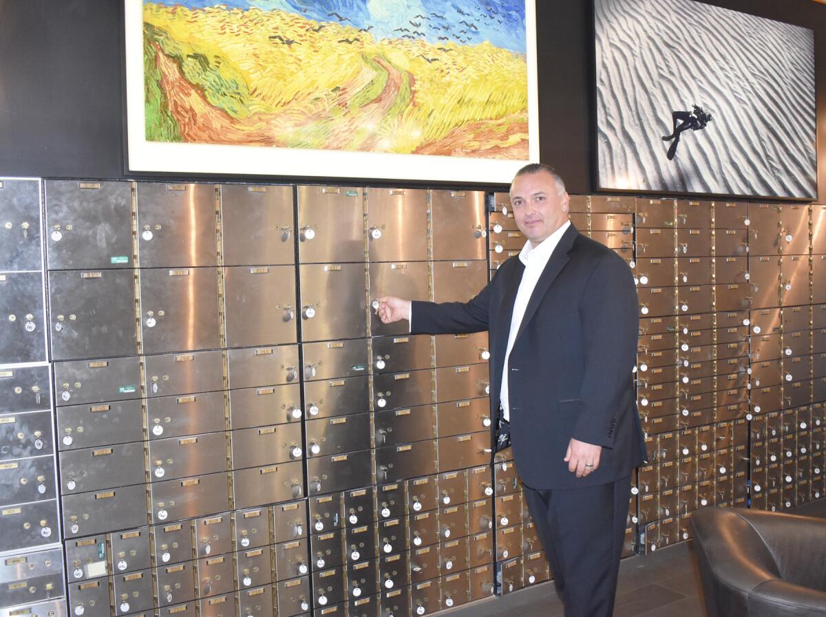 Raymond J. Lucia Jr. in a former bank vault turned into a lounge in his company’s Rancho Bernardo headquarters.