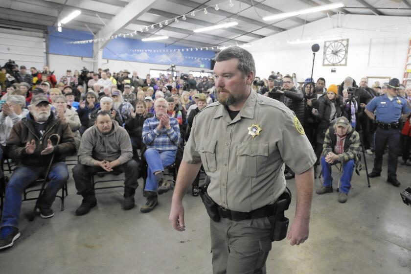 When Harney County Sheriff David Ward met with residents Jan. 6 in Burns, Ore., he seemed determined to create some drama, casting himself as the lead character.