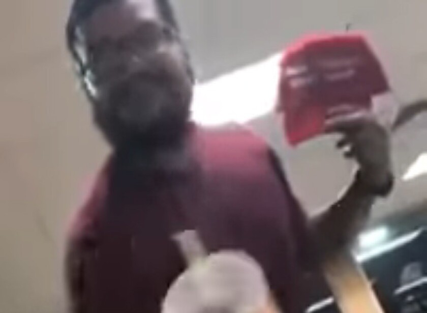 The man who ripped a "Make America Great Again" hat off a teen inside a Whataburger may have been motivated by racist remarks.
