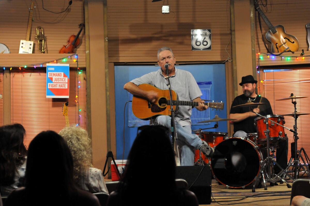 The Regular Joes, fronted by singer-songwriter Joe Baxter, center, performing at the Blue Door in Oklahoma City.