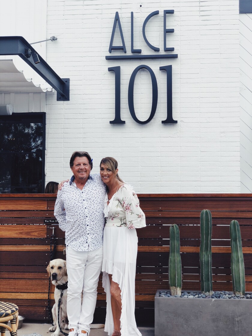 ALCE 101 owners Bradley and Julie Evarts with their dog Moose.