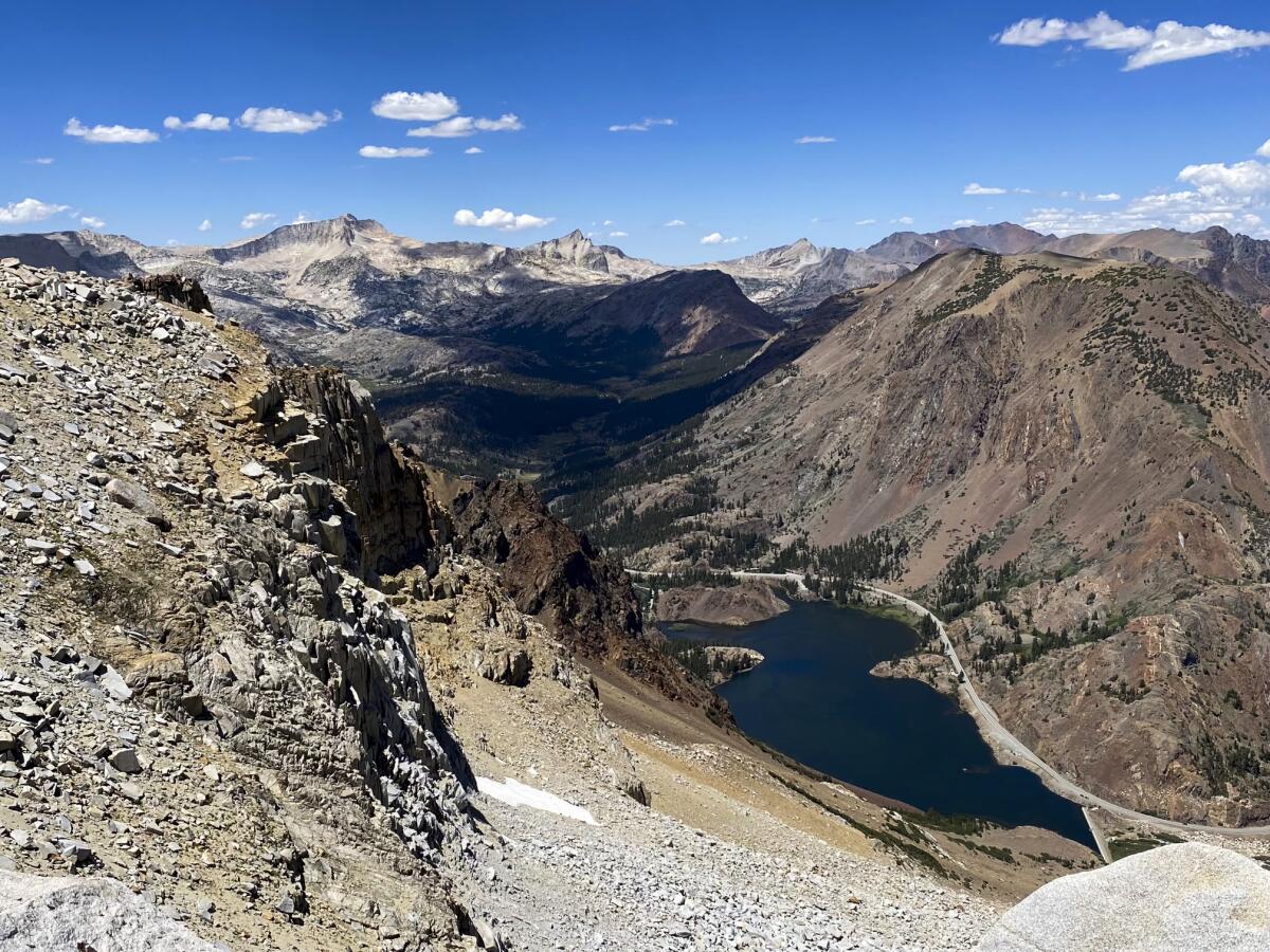 A view of Tioga Road snaking past Ellery Lake.
