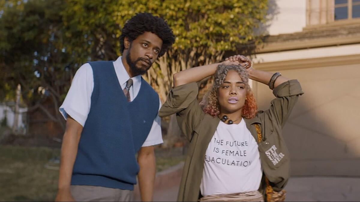 Lakeith Stanfield and Tessa Thompson appear in "Sorry to Bother You."