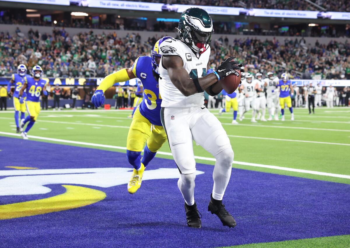 Saquon Barkley runs over Rams for 255 yards as Eagles roll to seventh win in row 1 A.J. Brown catches a touchdown pass past Rams safety Quentin Lake to give the Eagles the halftime lead.