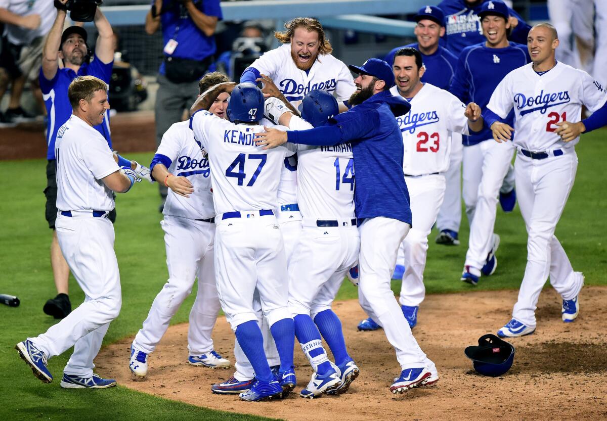The Dodgers celebrate after sweeping the Nationals.