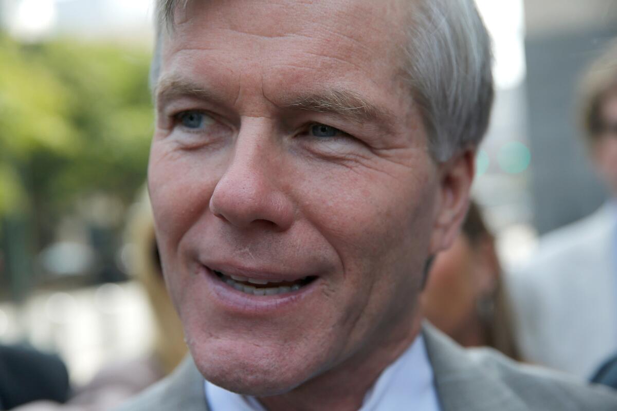 Former Virginia Gove. Bob McDonnell leaves his corruption trial at U.S. District Court in Virginia in August. He was convicted in September.