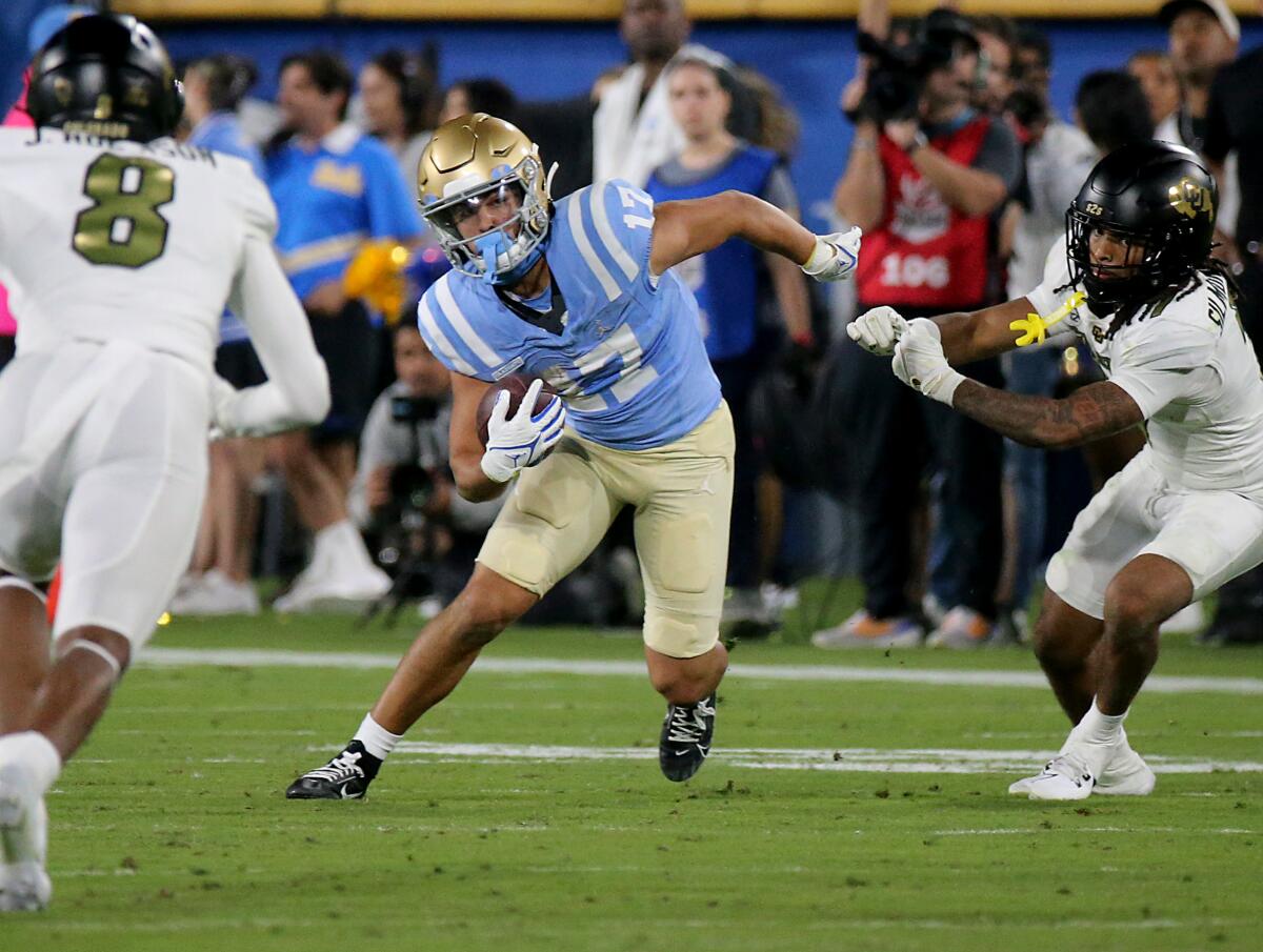 Pasadena, CA - UCLA wide receiver Logan Loya makes a catch against Colorado.