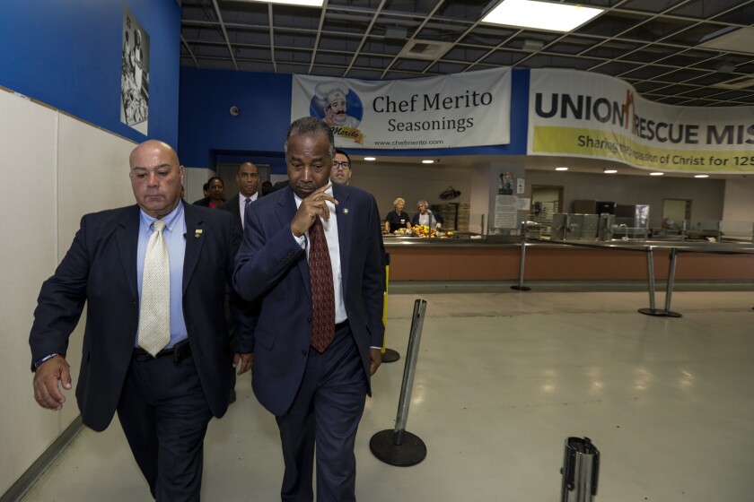 Ben Carson leaves Union Rescue Mission on skid row 