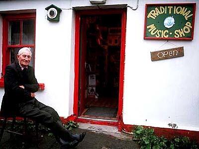 Tommy O'Brien takes his ease in Doolin, which became the hub of Irish music, one fellow says, because the local players didn't travel.