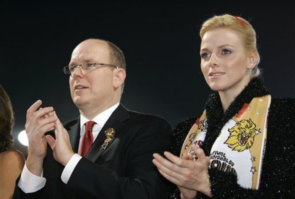 FILE - In this Tuesday, Jan. 22, 2008 file photo Prince Albert II of Monaco and Charlene Wittstock of South Africa attend the closing ceremony of the 32nd Monte Carlo International Circus Festival in Monaco. The royal palace says Prince Albert of Monaco is engaged to South African former swimmer Charlene Wittstock. The principality says in a statement that the engagement was announced between the 52-year-old prince and 32-year-old Wittstock, Wednesday June 23, 2010. (AP Photo/Lionel Cironneau, Pool, File)