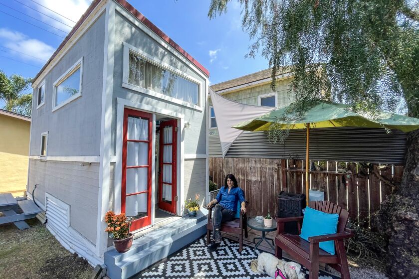 A two-story tiny house can be found in the backyard of San Diego resident Daria VanNice. It has two sleeping lofts.