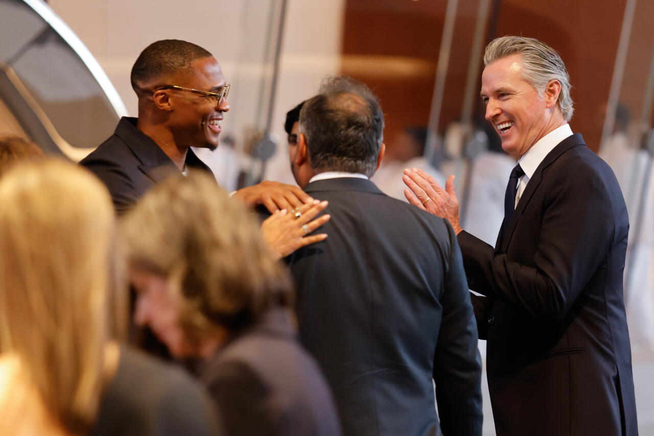 Gov. Gavin Newsom mingles with guests at the Lucas Museum of Narrative Art opening party.