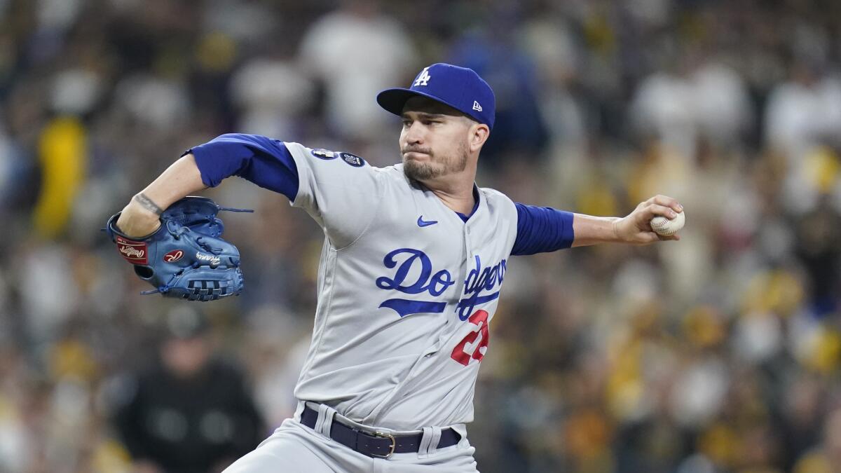 Dodgers relief pitcher Andrew Heaney delivers in the third inning.