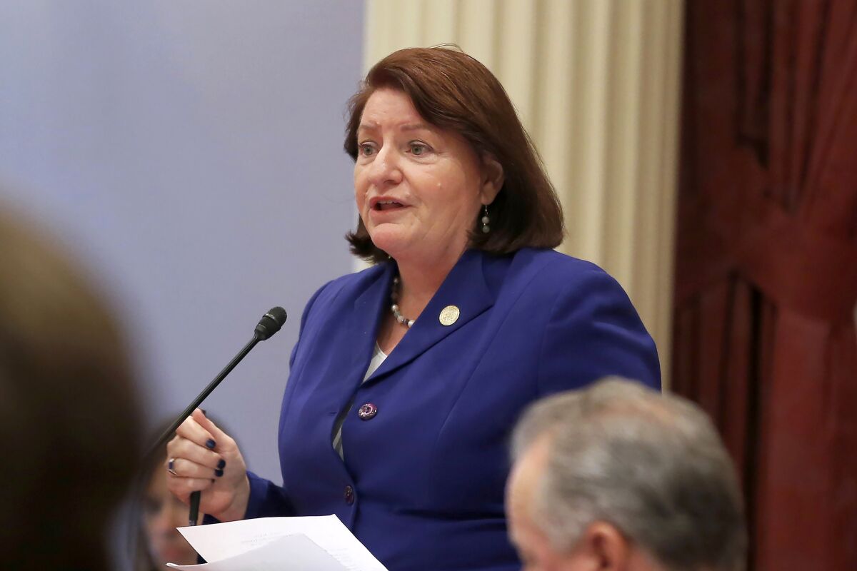 FILE - California state Senate President Pro Tem Toni Atkins, of San Diego, speaks on the floor of the Senate in Sacramento, Calif., on Sept. 12, 2019. Atkins on Wednesday, March 29, 2023, called for the state to end its ban on state-funded travel to states with policies that discriminate against LGBTQ people. The ban now covers almost half of the 50 states and Atkins says it has put a burden on academic researchers and sports teams at public colleges and universities. (AP Photo/Rich Pedroncelli, File)
