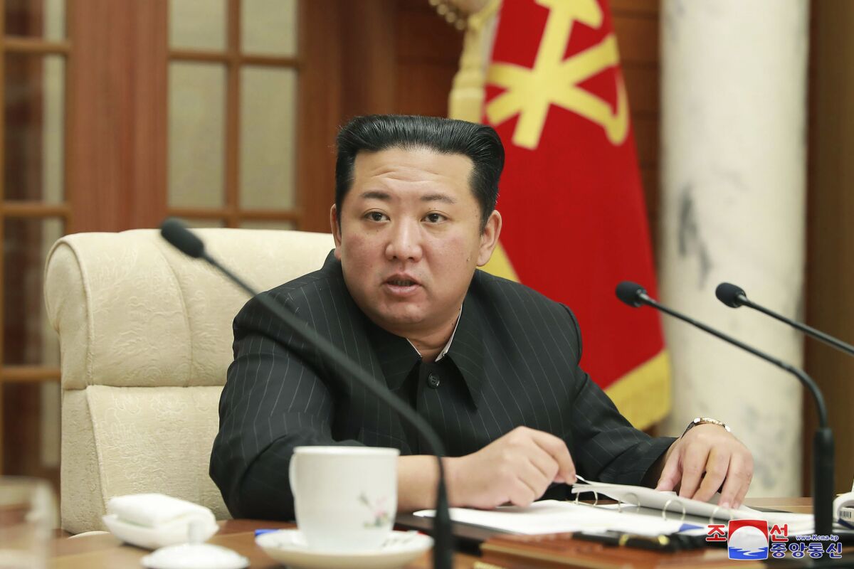 FILE - In file this photo provided by the North Korean government, North Korean leader Kim Jong Un attends a meeting of the Central Committee of the ruling Workers' Party in Pyongyang, North Korea, Jan. 19, 2022. Kim and his wife attended a Lunar New Year's Day concert in Pyongyang where he received thunderous cheers from audience members and artists who praised him for heralding a "new era" of national power, state media reported. The content of this image is as provided and cannot be independently verified. Korean language watermark on image as provided by source reads: "KCNA" which is the abbreviation for Korean Central News Agency. (Korean Central News Agency/Korea News Service via AP, File)