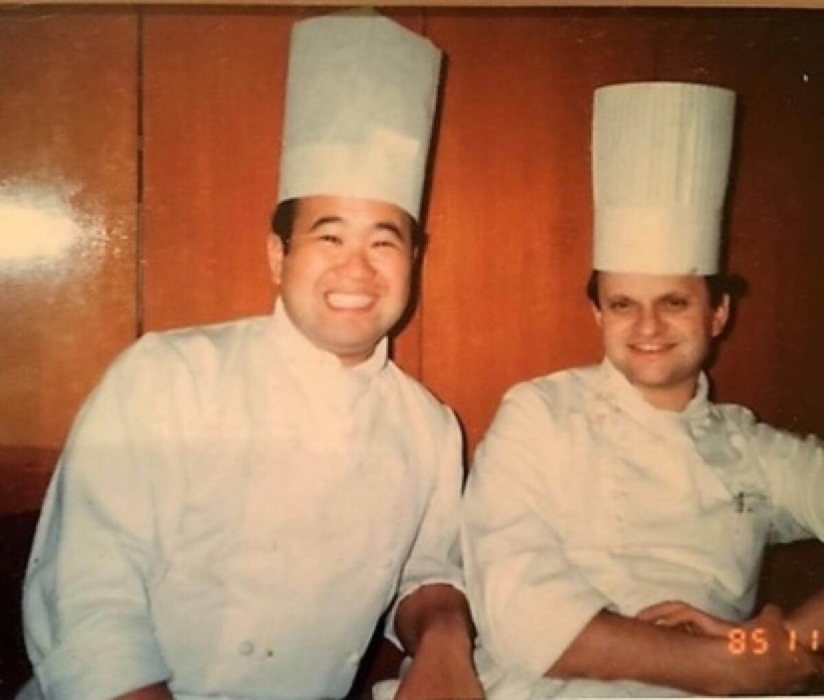 Chef Akira Hirose, left, with French chef Jo?l Robuchon in 1985.