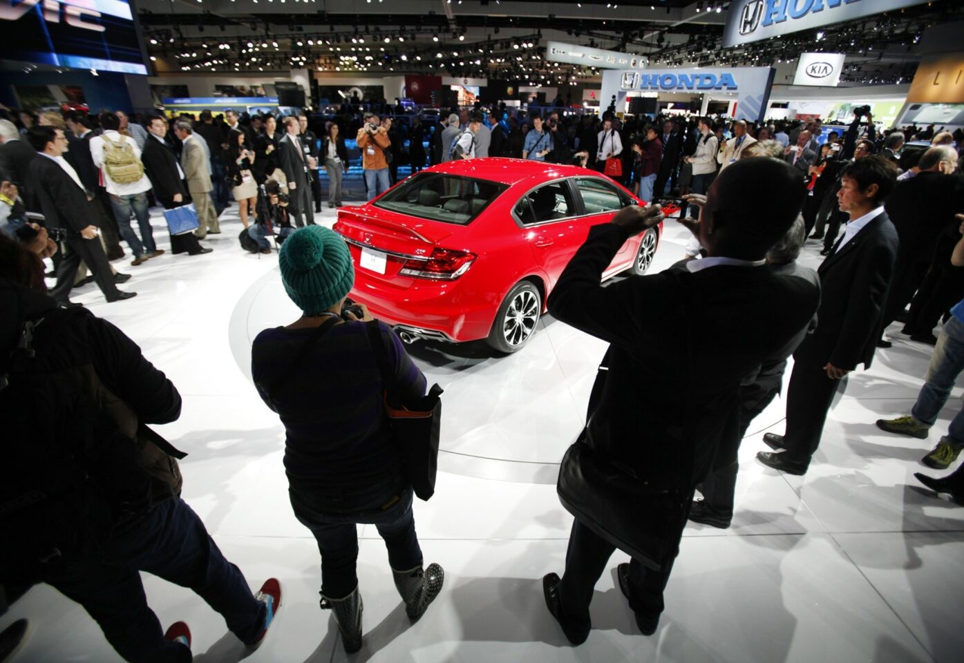 The 2013 Honda Civic draws a crowd.