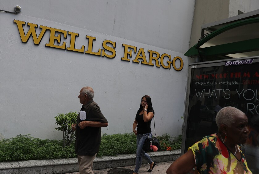 A Wells Fargo bank branch in Miami is shown. The Senate Banking Committee has scheduled a hearing next week on Wells Fargo’s sales practices.