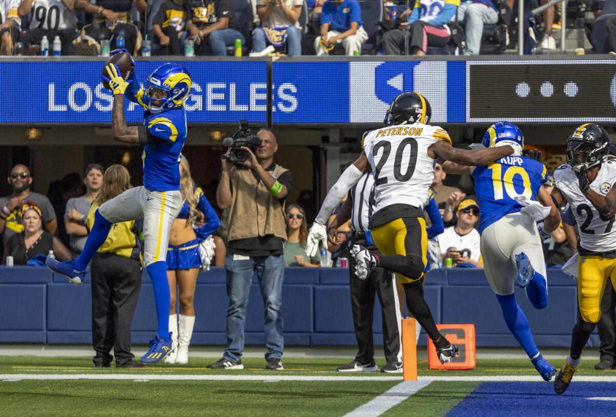 Rams receiver Tutu Atwell  catches a second quarter pass before running into the end zone for a score.