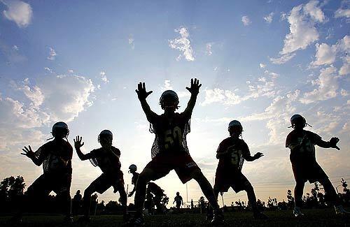 As the sun sets on a field with no lights at the California School for the Deaf in Riverside, the Cubs field goal unit practices kicks. On the front line, flanking the player at center, are four seniors who, just a year earlier, were part of the Cubs team that won the league championship. This year would be a stark contrast.