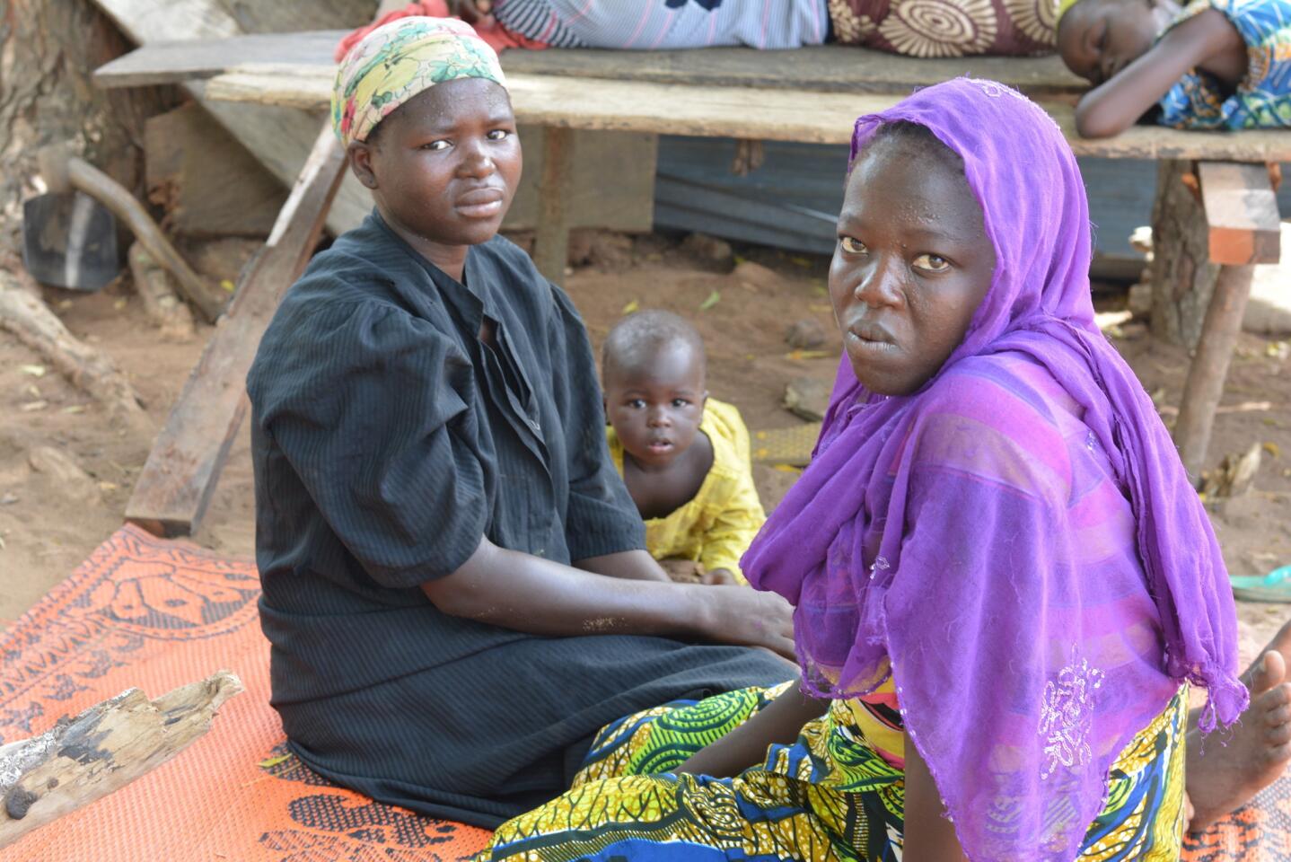 Two refugee women, forced to flee their homes in north eastern Nigeria after attacks by Boko Haram.