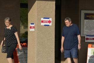 Voters leave a precinct after casting their ballots in the state's primary election, Tuesday, July 30, 2024, in Sun City West, Ariz. (AP Photo/Ross D. Franklin)