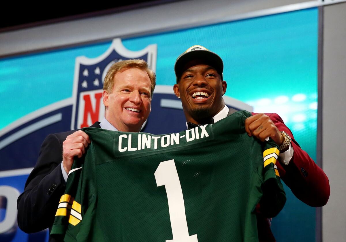 Ha Ha Clinton-Dix poses with NFL Commissioner Roger Goodell after being picked 21st overall by the Green Bay Packers during the first round of the 2014 NFL draft Thursday at Radio City Music Hall.