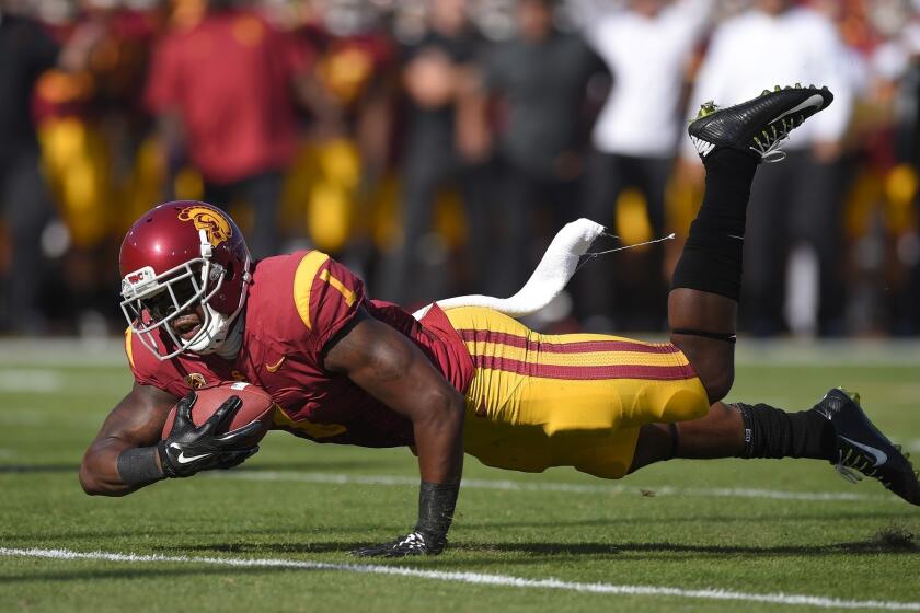 USC wide receiver Darreus Rogers dives for extra yardage against Fresno State on Aug. 30.