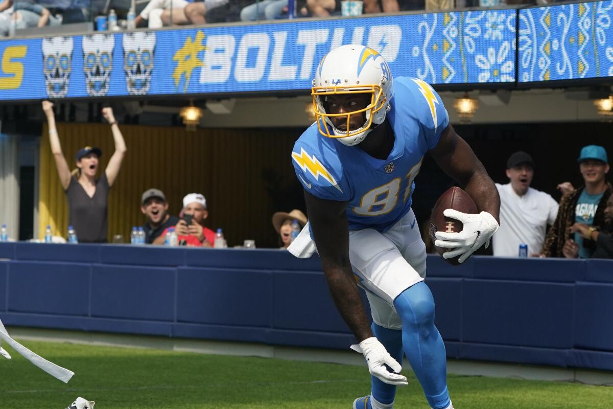 Chargers wide receiver Mike Williams runs after catching a touchdown pass.