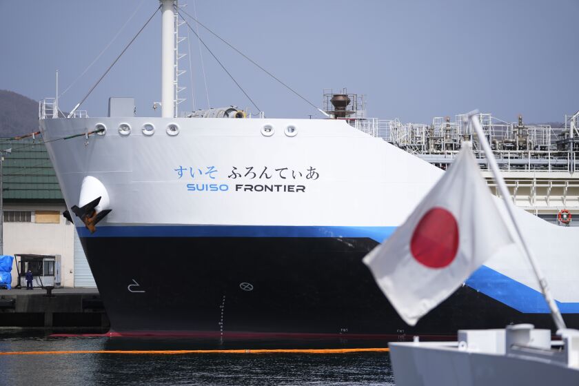 The Suiso Frontier, a liquefied hydrogen carrier, is berthed in Otaru, northern Japan, on April 14, 2023. Japan’s government on Tuesday, June 6, 2023, adopted a revision to the country’s plans to use more hydrogen as fuel as part of the effort to reduce carbon emissions. (AP Photo/Hiro Komae, File)