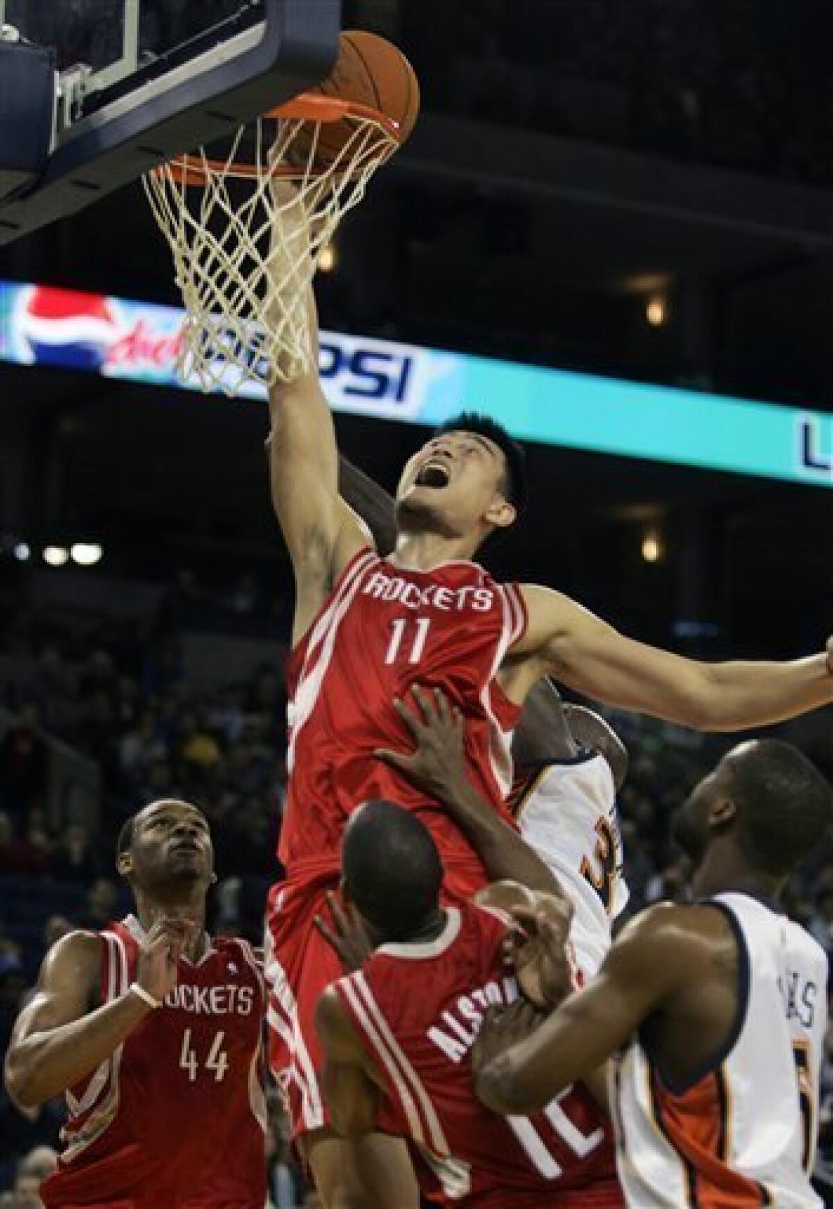 Yao Ming's No. 11 retired by Rockets