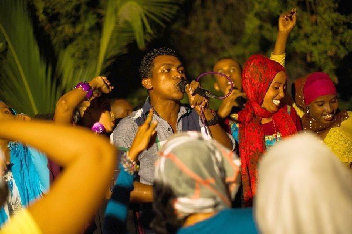 Rap group Waayaha Cusub performs at the Somali Reconciliation Festival in Mogadishu, the city's first major music festival in two decades. The musicians aim to counter Islamist militants' message of violence with one of peace.