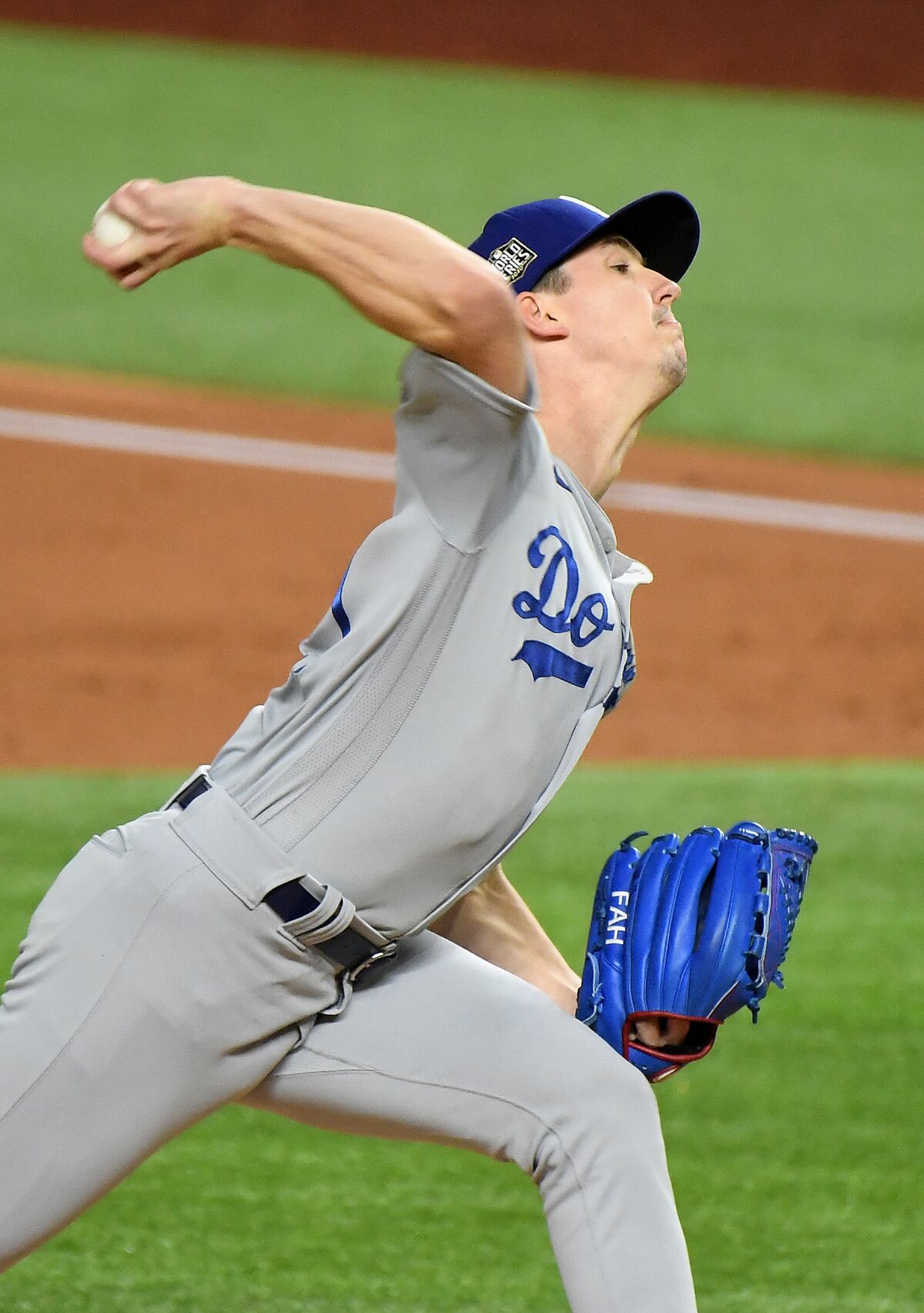 Dodgers pitcher Walker Buehler delivers during the first inning of Game 3.