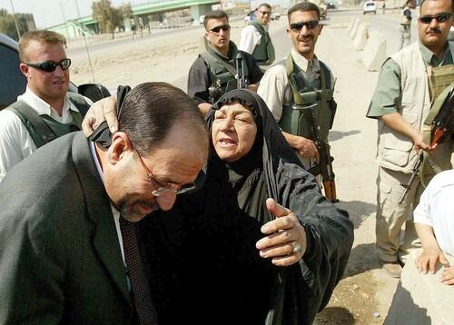 Iraqi woman with Nouri Maliki