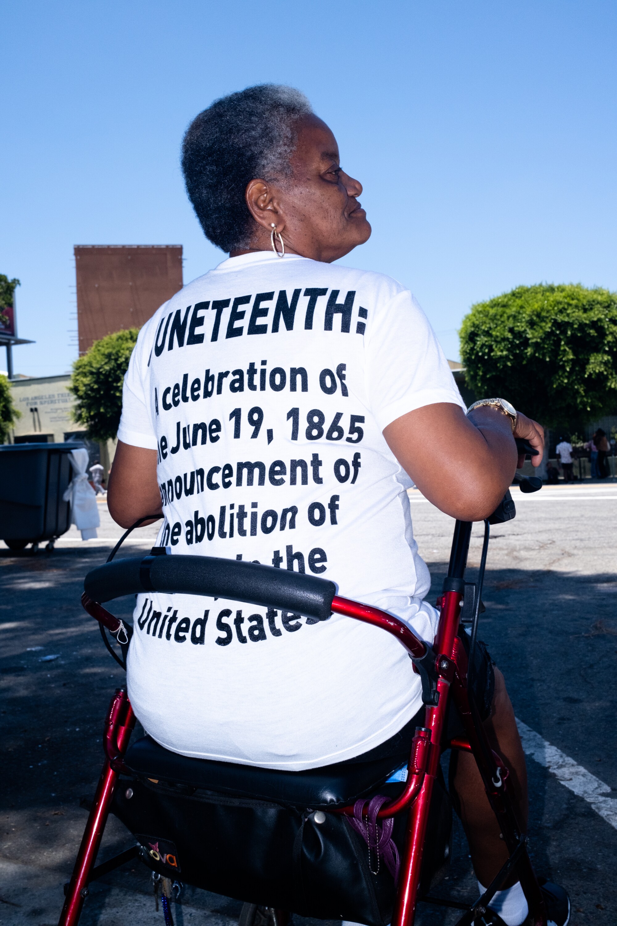 Tina Edwards, 62, from Leimert Park, shows off a T-shirt celebrating Juneteenth.