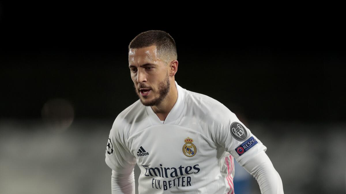 FILE - In this Tuesday, Nov. 3, 2020 file photo, Real Madrid's Eden Hazard during their Champions League group B soccer match against Real Madrid at the Alfredo Di Stefano stadium in Madrid, Spain. Real Madrid players Eden Hazard and Casemiro have tested positive for COVID-19, the Spanish club said. The 29-year-old Belgium forward and the 28-year-old Brazil midfielder will now miss their trip to Valencia on Sunday, Nov. 8, 2020. (AP Photo/Bernat Armangue, file)