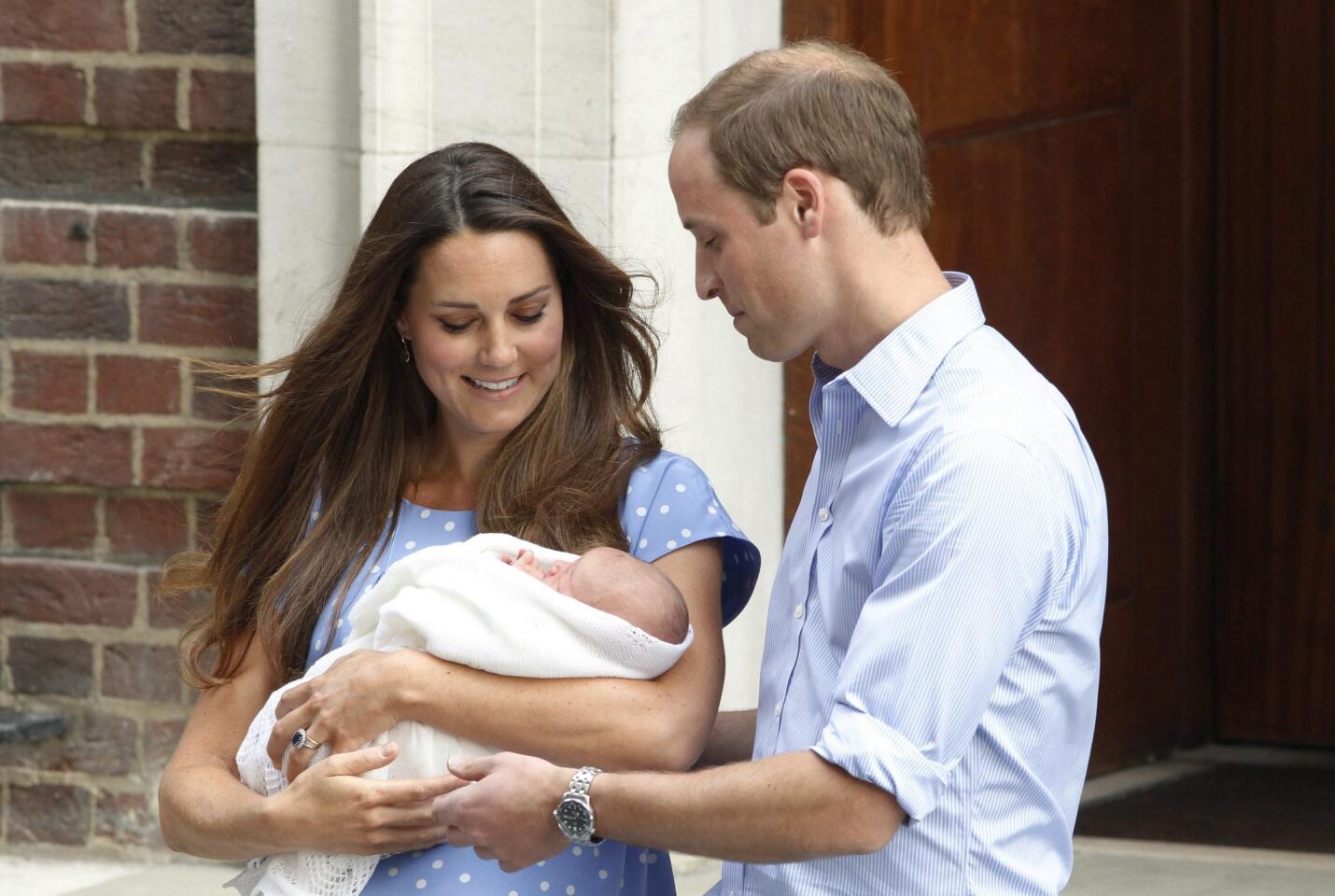 Catherine, Duchess of Cambridge with son Prince George and Prince William, Duke of Cambridge