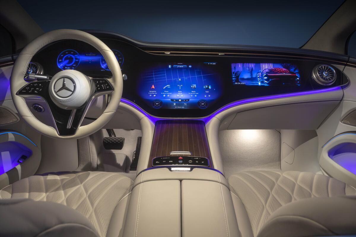 Infotainment dashboard on 2022 Mercedes-Benz EQS shows several screens.