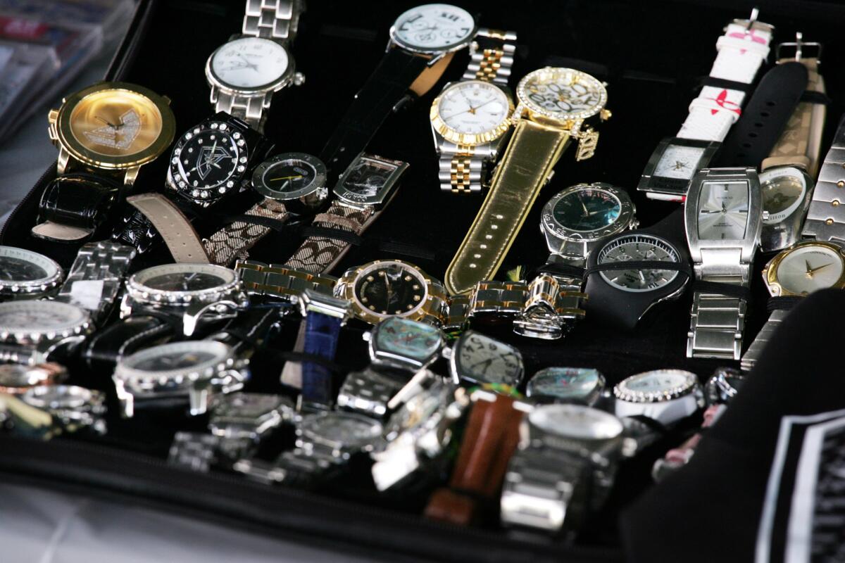 Counterfeit watches that were seized by the Los Angeles Anti-Piracy Task Force. L.A. City Atty. Mike Feuer on Wednesday announced his office won a $3.96-million judgment against a downtown L.A. merchant who was selling counterfeit goods.