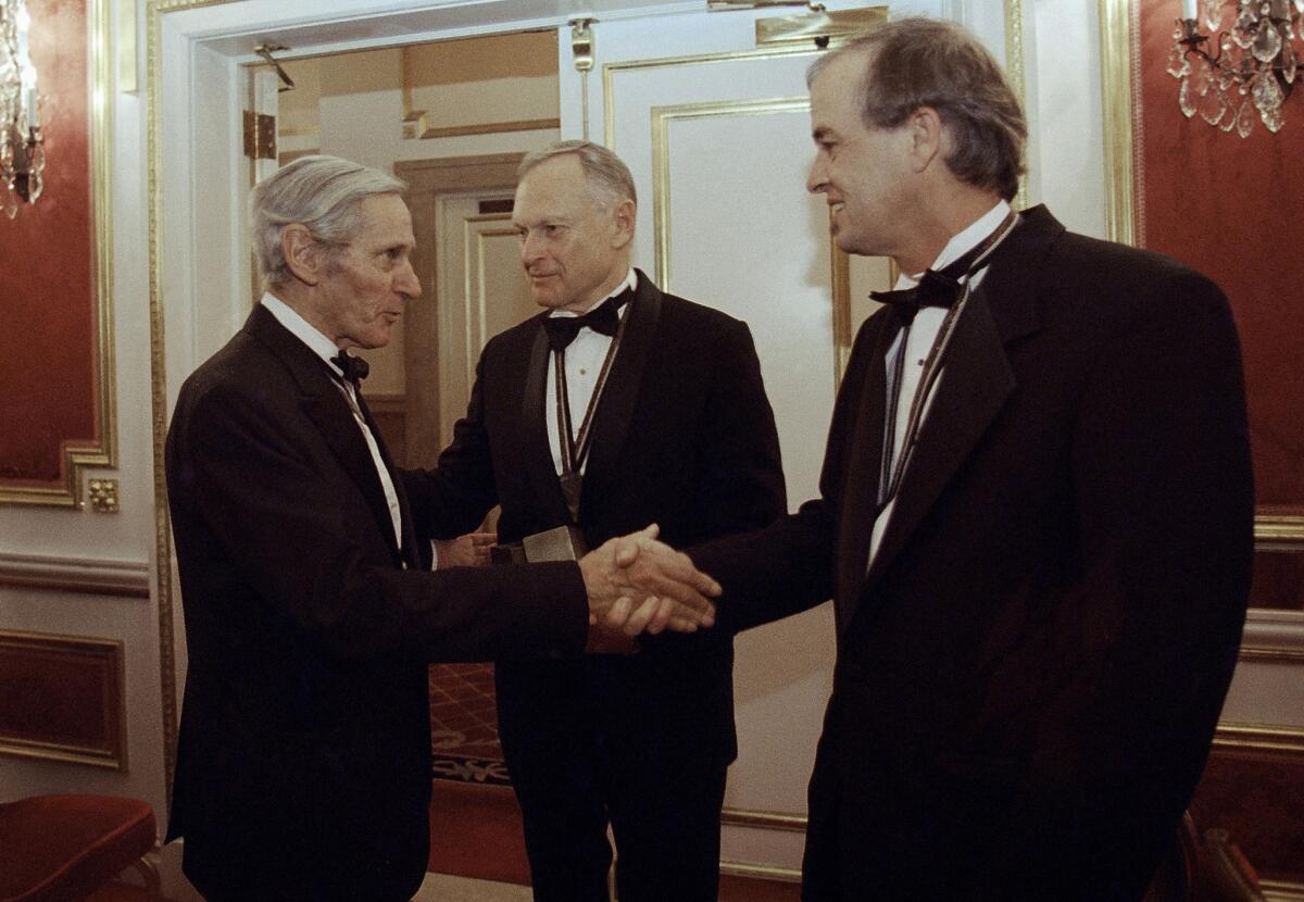 Sherwin B. Nuland, center, at the National Book Awards with fellow winning authors William Gaddis, left, and James Tate.