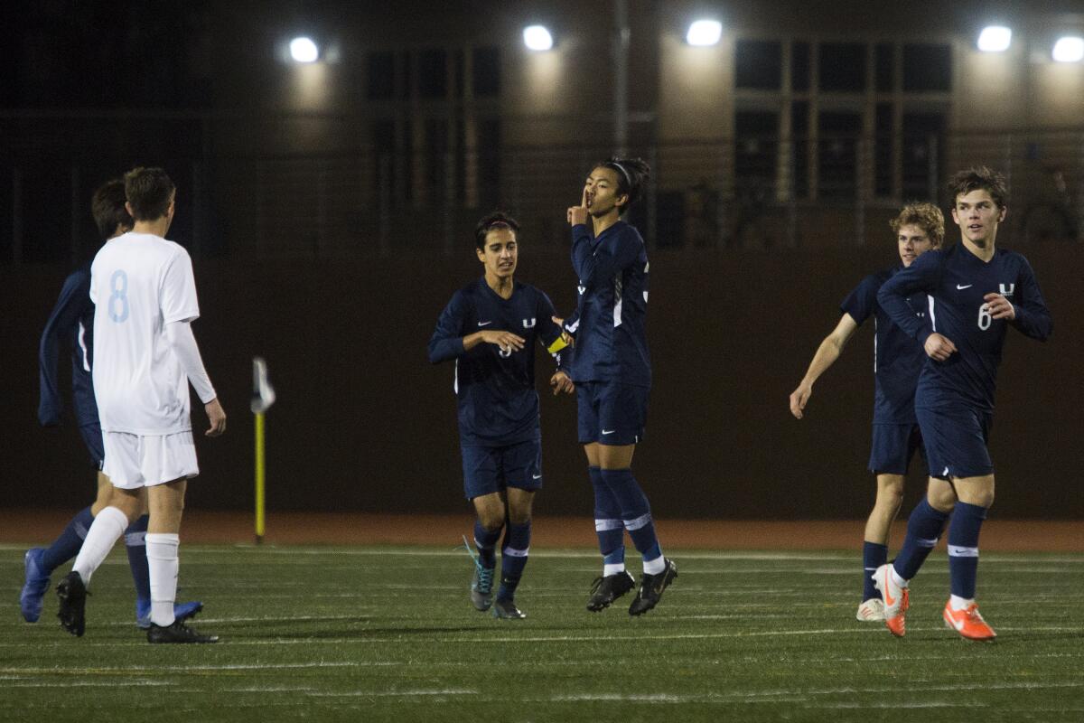 University's Kaili Chen, center, celebrates after scoring against Corona del Mar in the 65th minute of a nonleague match on Thursday in Irvine.
