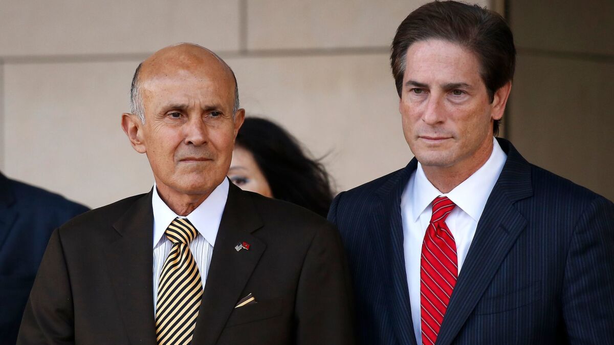 Former L.A. County Sheriff Lee Baca, left, with attorney Nathan Hochman after Baca was convicted on charges of obstruction of justice and lying.