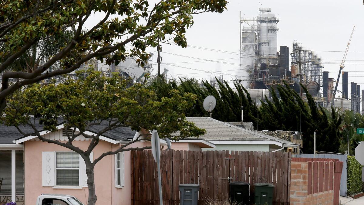 The air monitoring rules come as a series of fires, explosions, flaring incidents and other emergencies has sent smoke, dust and other pollutants into neighborhoods in recent years. Above, PBF Energy's Torrance Refining Co.