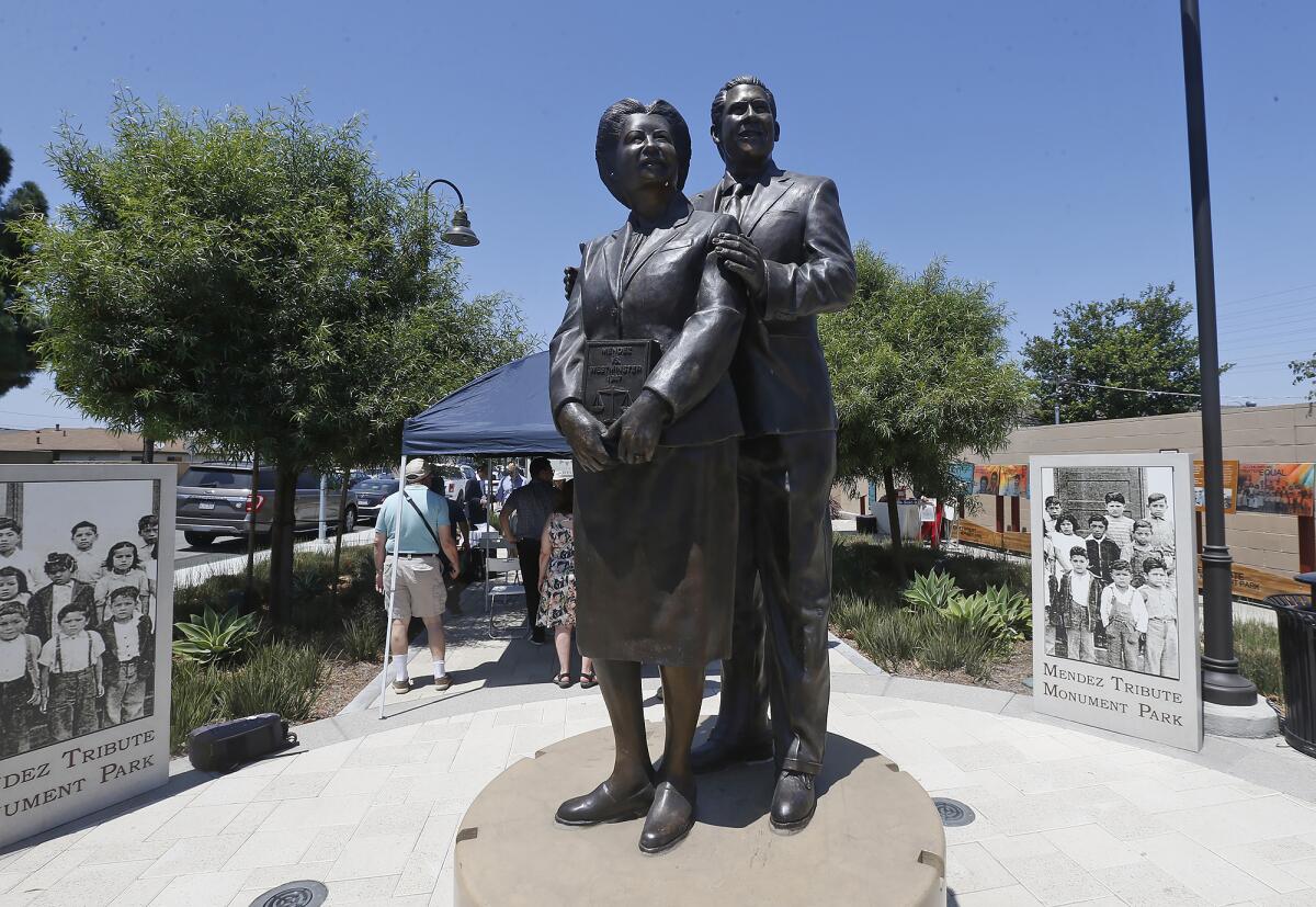 A statue of the Mendez parents by artist Ignacio Gomez.