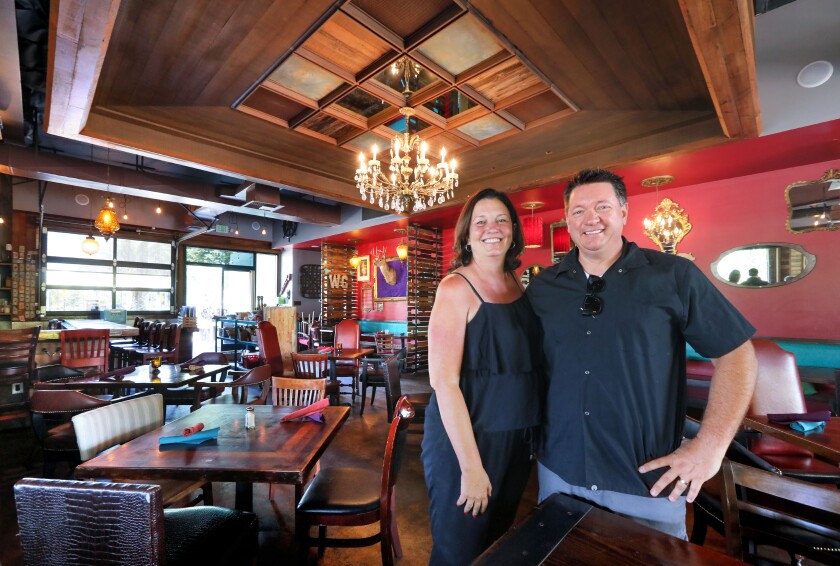 Portrait of Aaron, left, and Roddy Browning, owners of the Flying Pig Pub & Kitchen in their Vista restaurant's dining room. They'll close the restaurant on Sept. 2 for an eight-day revamp into the more casual, community-focused TownHall Public House concept.