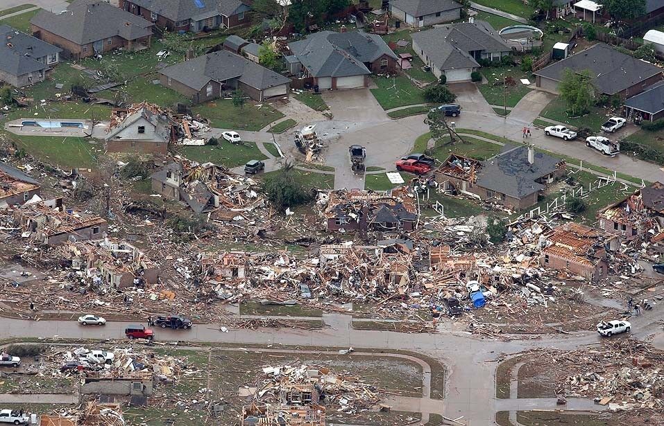An aerial view of the aftermath of Monday's tornado in Moore, Okla., shows homes that have been destroyed across the street from other dwellings that appear untouched.