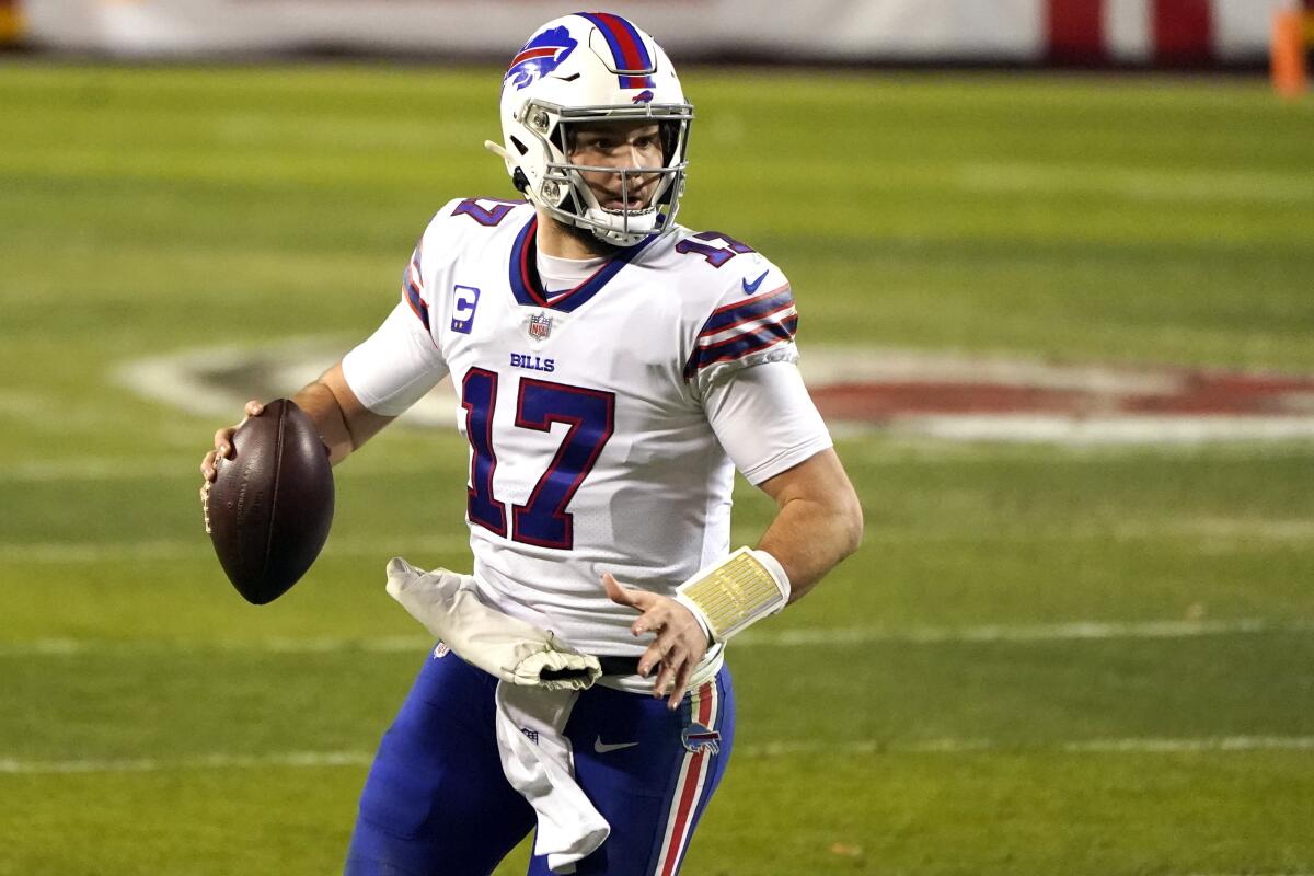 Josh Allen looks to pass during a game.