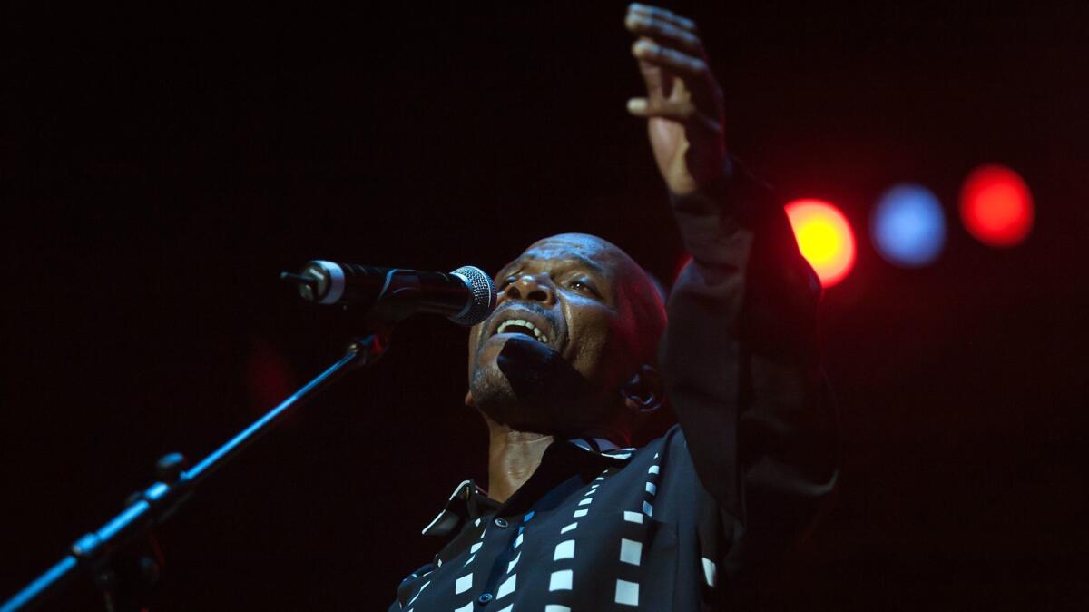 South African jazz singer and guitarist Ray Phiri performs in 2006 at the Durban Jazz Festival in Durban, South Africa. The musician died Wednesday.