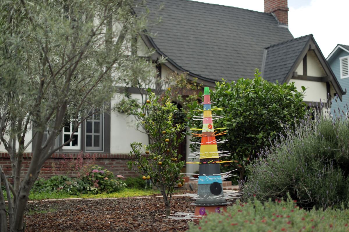 Mark Steven Greenfield's totem sculpture, "Homage to Mestra Didi," is in an Altadena garden.